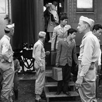 People exiting a train from the Jerome Relocation Center in Arkansas.