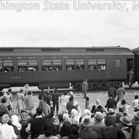 Crowd watching a train departing to the Tule Lake Relocation Center